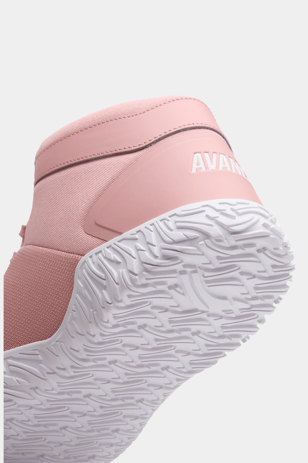 Pink powerlifting sneaker with white sole on a light gray background